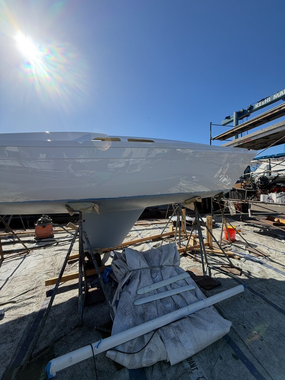Freshly polished hull surface in a boatyard