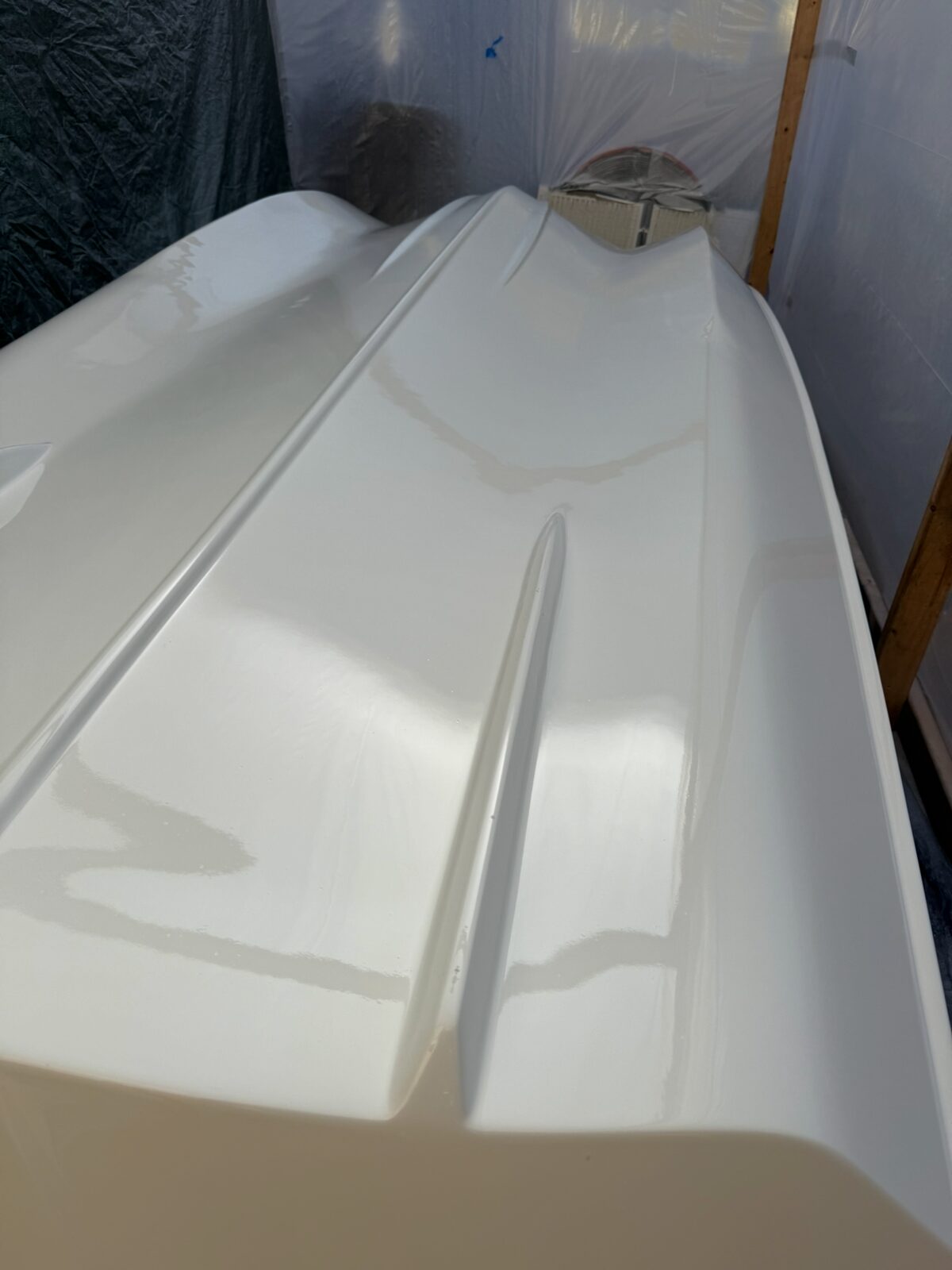 Clean white fiberglass surface after finish work